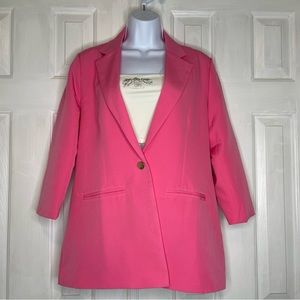 A Two piece Pink Blazer Set.